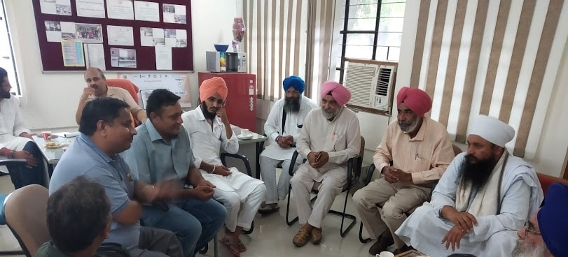 sardar gurdev singh saini chairning the meeting of farmers